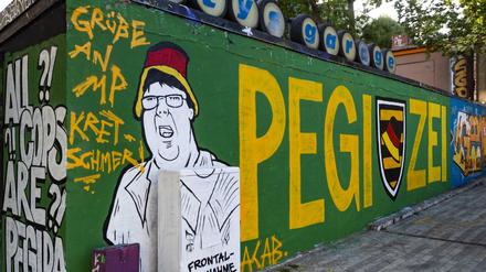 Ein Grafitti mit dem Konterfei des "Hutbürgers" in Dresden 