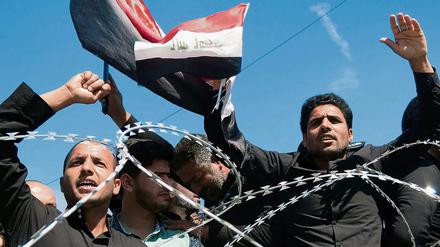 Das gespaltene Land. In Iraks Hauptstadt Bagdad haben vor kurzem Tausende Schiiten gegen Korruption und Vetternwirtschaft der Machtelite protestiert.