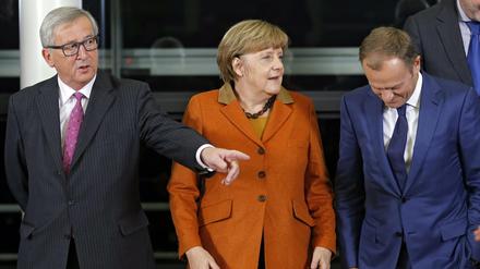 EU-Kommissionspräsident Jean-Claude Juncker, Kanzlerin Angela Merkel und EU-Ratschef Donald Tusk (von links) im vergangenen Oktober in Brüssel.