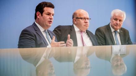 Arbeitsminister Heil (SPD), Wirtschaftsminister Altmaier (CDU) und Innenminister Seehofer (CSU)