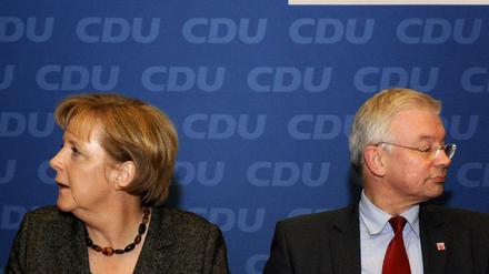 Angela Merkel und Hessens Ex-Ministerpräsident Roland Koch 2010. 
