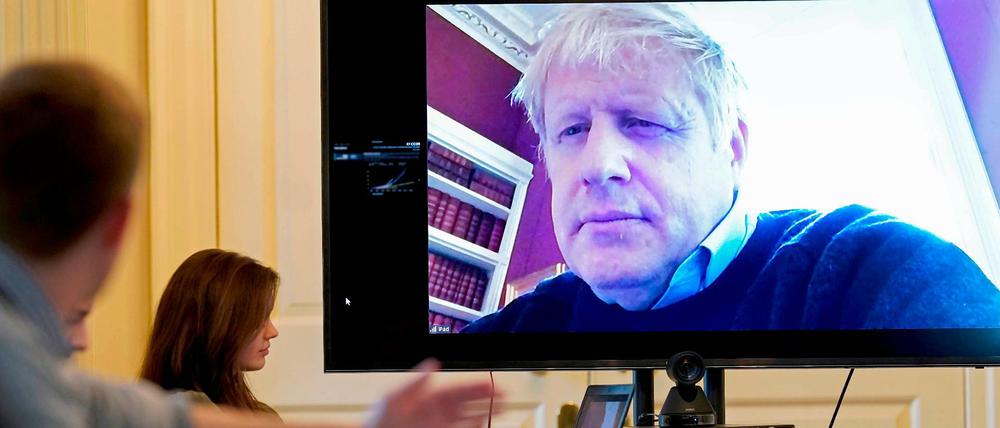 Zunächst war er noch optimistisch: Boris Johnson nimmt einen Tag nach Bekanntgeben der Corona-Infektion per Video an einer Konferenz teil.