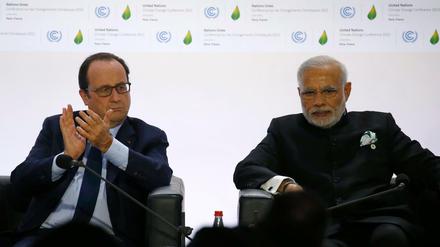 Zum Beginn des Weltklimagipfels haben der französische Präsident Francois Hollande (L) und der Indische Premierminister Narendra Modi eine Initiative zur Verbreitung von Solarenergie vor allem in Tropenländern, die International Solar Alliance (IASTA) vorgestellt. 