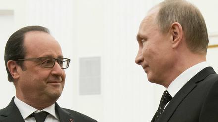 Der russische Präsident Wladimir Putin (rechts) und Frankreichs Präsident Francois Hollande 