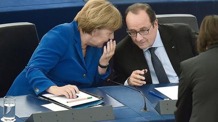 Kanzlerin Angela Merkel und Frankreichs Präsident François Hollande im vergangenen Oktober im Europaparlament in Straßburg. 