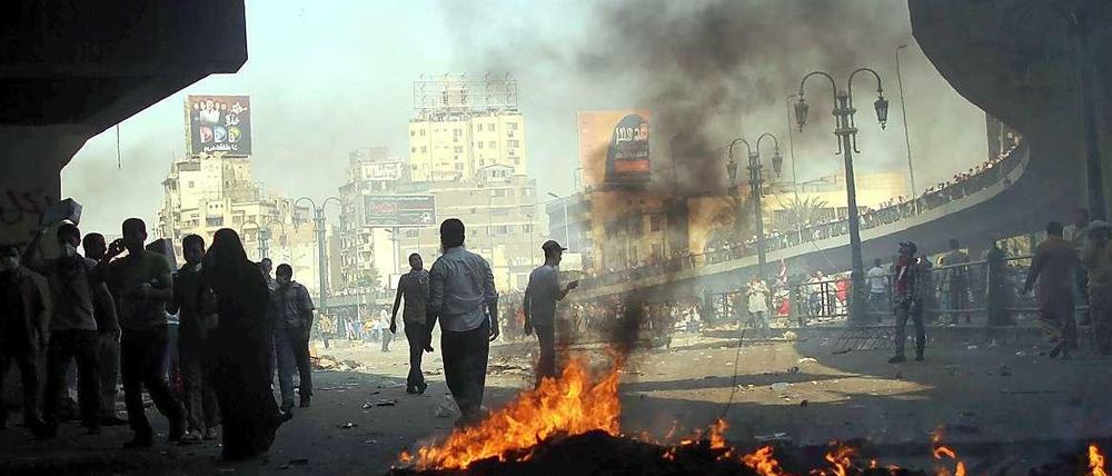 Gewalttätige Konfrontationen waren am Freitag in verschiedenen Stadtteilen Kairos im Gang.