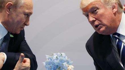 Wladimir Putin und Donald Trump bei ihrem langen Gespräch in Hamburg.