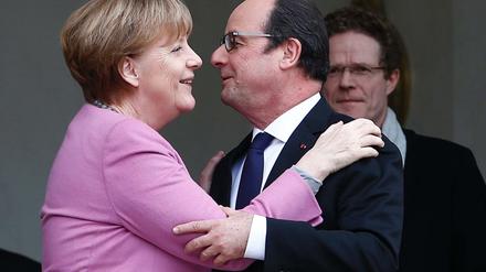 Bundeskanzlerin Angela Merkel und Frankreichs Staatschef François Hollande am Freitag in Paris.