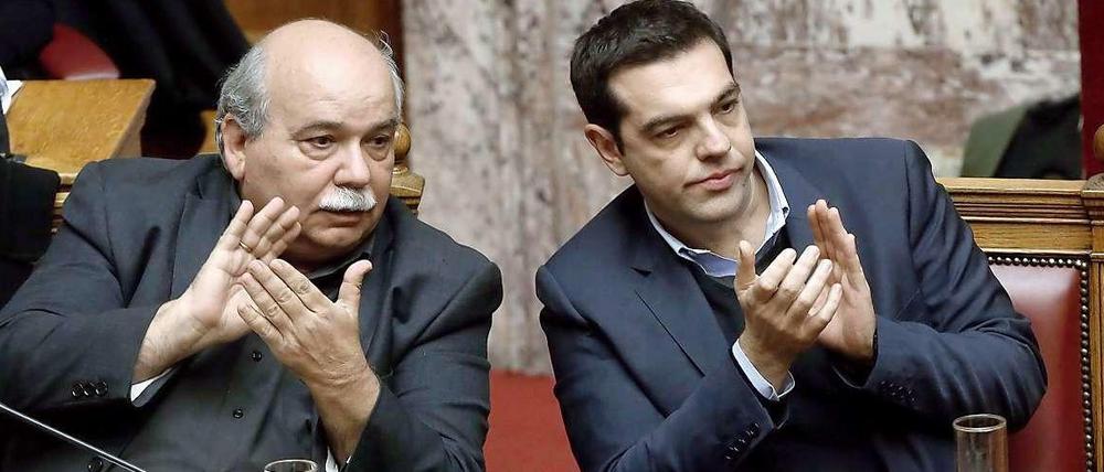Griechenlands Innenminister Nikos Voutsis, Regierungschef Alexis Tsipras.