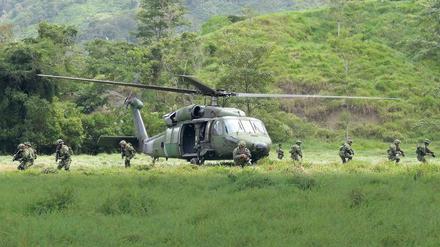 Grüne Zone. Soldaten des kolumbianischen Militärs sollen die ehemals von Farc-Rebellen gehaltenen Gebiete sichern.