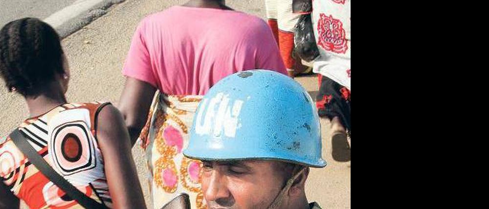 Unter Aufsicht. Blauhelme versuchen Bewohner Abidjans zu schützen. 