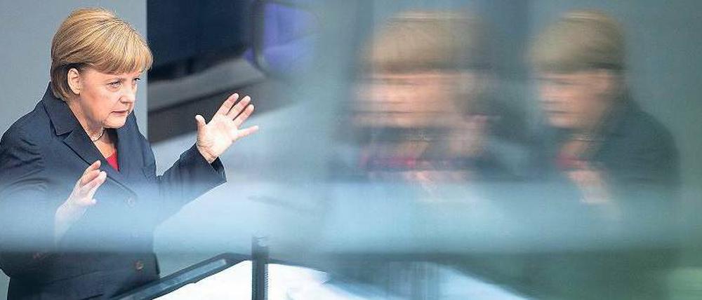 Nicht die Lösung. Bundeskanzlerin Angela Merkel (CDU) am Donnerstag bei einer Regierungserklärung vor dem G-20-Gipfel im Bundestag. 