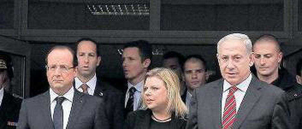 Am Tatort. Hollande (l.) und Netanjahu nach der Gedenkfeier in Toulouse.Foto: dpa