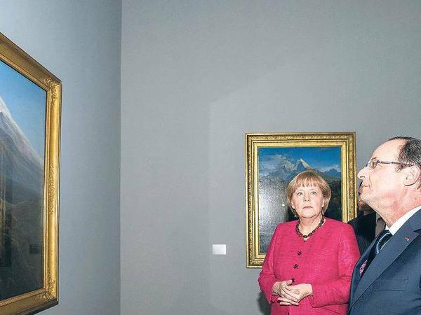 Verheißungsvolles und Düsteres zeigt der Louvre in einer Ausstellung über deutsche Kunst von 1800 bis 1939. Merkel und Hollande besichtigten sie gemeinsam.