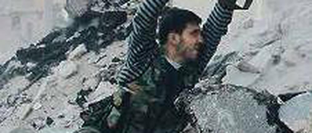 Ein Kämpfer der „Freien Syrischen Armee“ in der Stadt Aleppo. Foto: Reuters