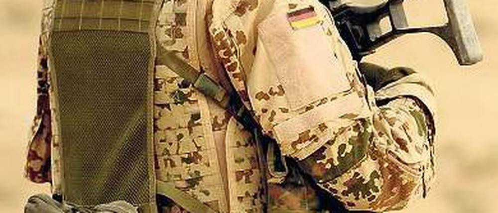 Noch gebraucht? Ein Soldat der deutschen Truppe in Afghanistan. Deren Abzug rückt näher – allerdings begleitet von wachsender Gewalt. Foto: Maurizio Gambarini/dpa