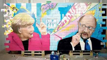 „Macht! Kampf! Wahl!“: Für die ZDF-Dokumentation zum Endspurt des Bundestagswahlkampfes hat der Künstler Dejan Kutanoski ein Doppelportrait von Kanzlerin Angela Merkel (CDU) und ihrem Herausforderer Martin Schulz (SPD) gesprayt. Die Sendung ist in der ZDF-Mediathek zu sehen.