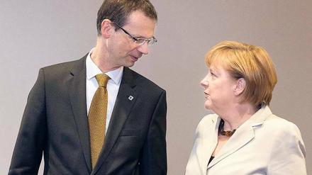 Die Chefin und ihr Helfer. Uwe Corsepius hat für Kanzlerin Angela Merkel den EU-Gipfel vorbereitet. 