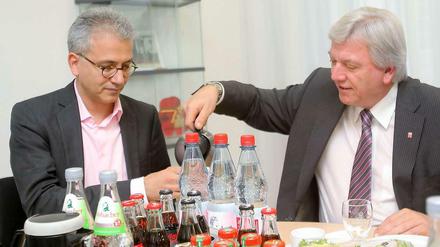Der CDU-Landesvorsitzende, Ministerpräsident Volker Bouffier und Grünen-Chef Tarek Al-Wazir loten Chancen einer Koalition aus.