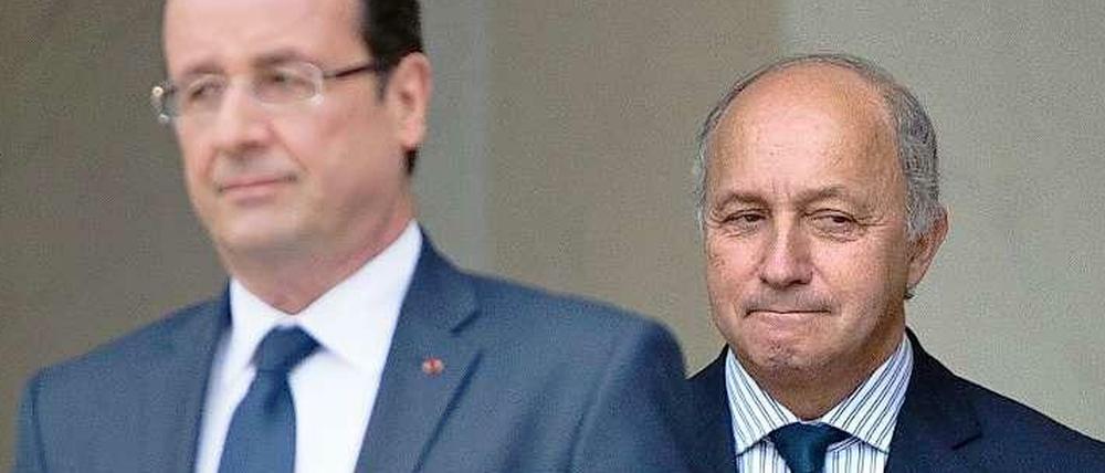 Frankreichs Präsident Francois Hollande (links) und sein Außenminister Laurent Fabius. 
