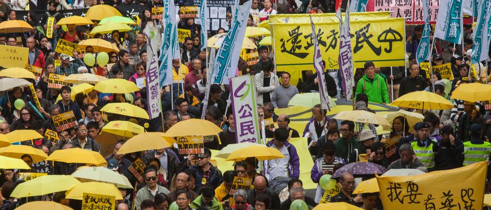 Teilnehmer einer Demonstration für freie Wahlen und mehr Demokratie in Hongkong