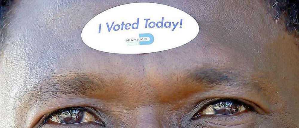 "I voted today!" Die Sticker sind begehrt. Obamas Wahlhelfer bemühen sich darum, Schwarze Wähler zu mobilisieren.