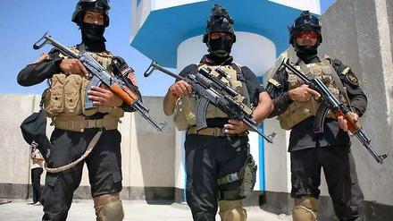 Irakische Sicherheitskräfte an einem Checkpoint.