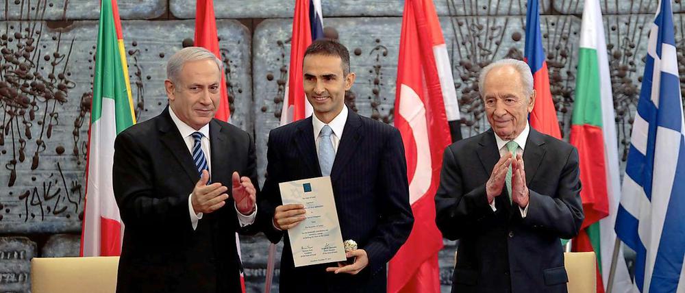 Israels Premier Netanjahu (links) und Präsident Peres (rechts) für den türkischen Löscheinsatz.