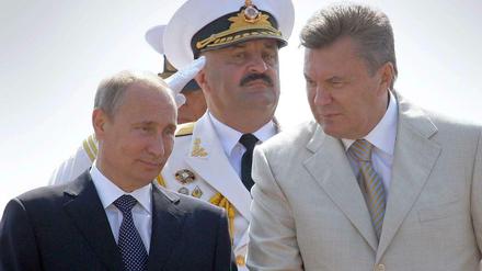 Der frühere ukrainische Präsident Viktor Janukowitsch und Russlands Präsident Wladimir Putin.