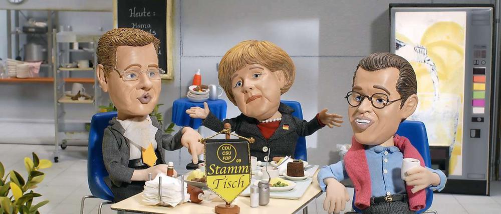 Schwarz-Gelb bleibt im Umfragetief. Die Animation zeigt die Trickfilmfiguren "Machtwort Merkel" (Mitte), "Alles Gutti" (rechts) und "Super Guido" als K-Team in der Kanzlerkantine. 