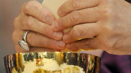 Teilen, auch mit wiederverheirateten Geschiedenen. Die deutschen Bischöfe öffnen die Kommunion.