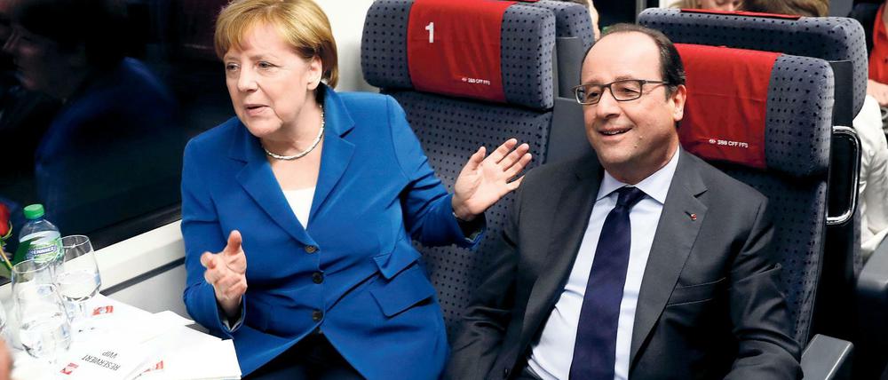 Ende einer Dienstfahrt. Kanzlerin Merkel und Frankreichs Staatschef Hollande im Juni bei der Eröffnung des Gotthard-Basistunnels.