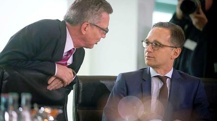 Innenminister Thomas de Maizière (CDU) und Justizminister Heiko Maas (SPD) haben monatelang über die Vorratsdatenspeicherung gestritten.
