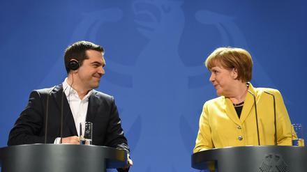 Bundeskanzlerin Angela Merkel und der griechische Ministerpräsident Alexis Tsipras vor der Presse in Berlin