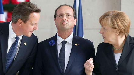 Der britische Premierminister David Cameron, der französische Präsident François Hollande und Bundeskanzlerin Angela Merkel erhöhen den Druck auf Russlands Präsident Putin. 