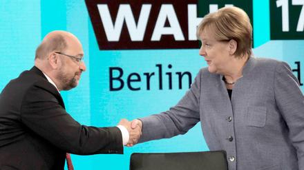 Bundeskanzlerin Angela Merkel (CDU) und SPD-Chef Martin Schulz am Abend der Bundestagswahl