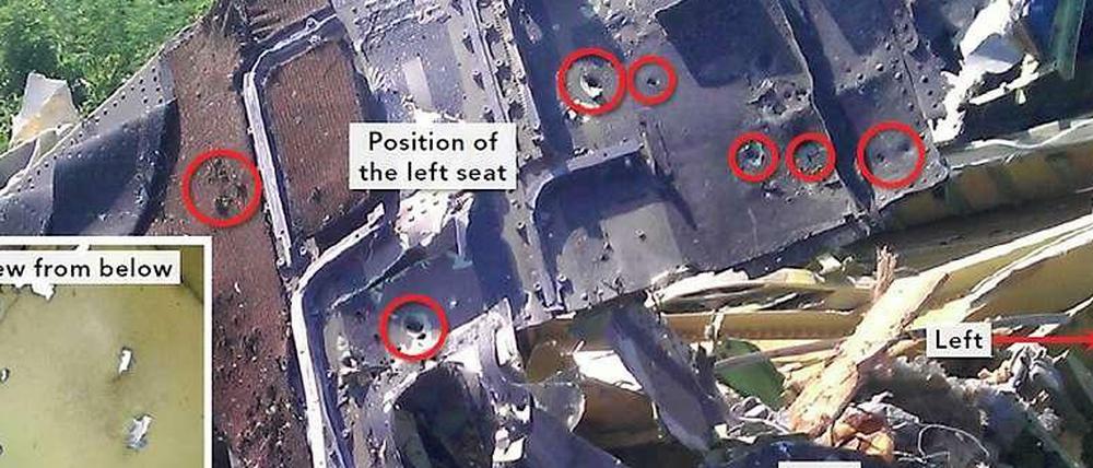 Dieses Foto, das aus dem Untersuchungsbericht stammt, zeigt Teile des Cockpits von MH17, das stark durchlöchert wurde. 