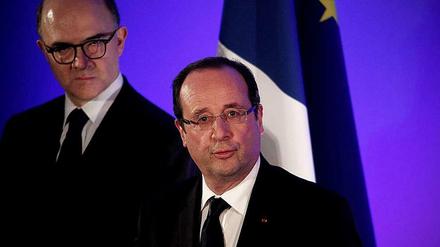Ein Duo für Griechenland: EU-Währungskommissar Pierre Moscovici (links) und Frankreichs Staatschef François Hollande.