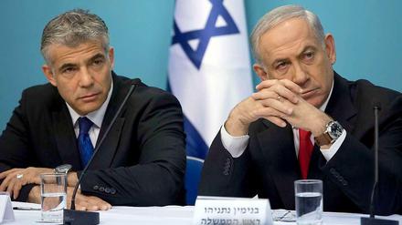 Haben sich nichts mehr zu sagen: Finanzminister Lapid (l.) und Regierungschef Netanjahu.
