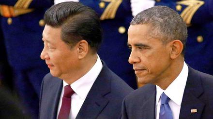 Der chinesische Parteichef Xi Jingping und US-Präsident Barack Obama in Peking.