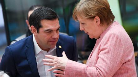 Der griechische Ministerpräsident Tsipras und Kanzlerin Merkel im vergangenen März in Brüssel.