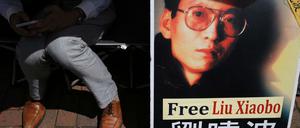 Ein Protestplakat in Hongkong zeigt das Porträt des chinesischen Friedensnobelpreisträgers Liu Xiaobo. 