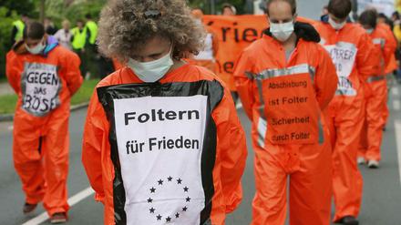 Proteste gegen Folter gab es rund um den Globus - hier in München. 