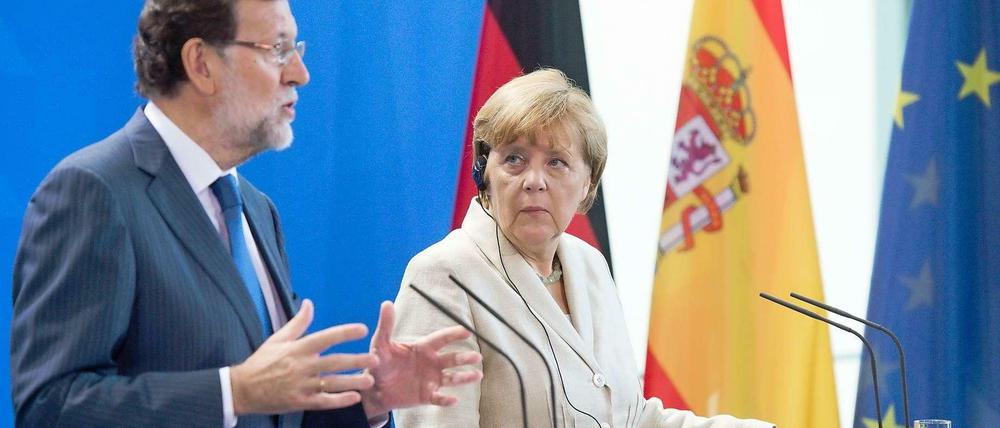 Spaniens Ministerpräsident Mariano Rajoy und Kanzlerin Angela Merkel am Dienstag in Berlin. 