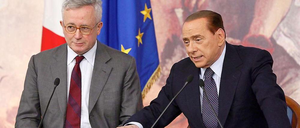 Hand auf Hand. Silvio Berlusconi (r.) verspricht gemeinsam mit seinem Wirtschaftsminister Giulio Tremonti größeren Sparwillen.