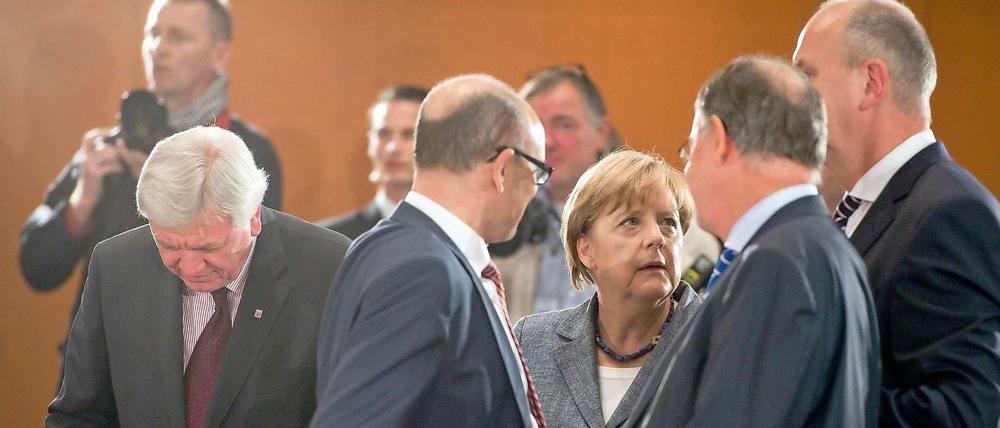 Die Kanzlerin mit den Ministerpräsidenten Bouffier, Sellering, Weil und Woidke.