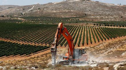 Baggern für die Siedler. Im Westjordanland soll eine neue Wohnanlage entstehen.