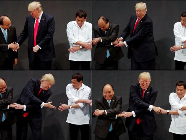 Verworren: US-Präsident Trump hat Mühe beim symbolischen Asean-Handschlag