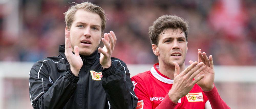 Unions Torwart Jakob Busk und Kapitän Benjamin Kessel zeigen ab der nächsten Saison einen neuen Hauptsponsor auf ihren Trikots.