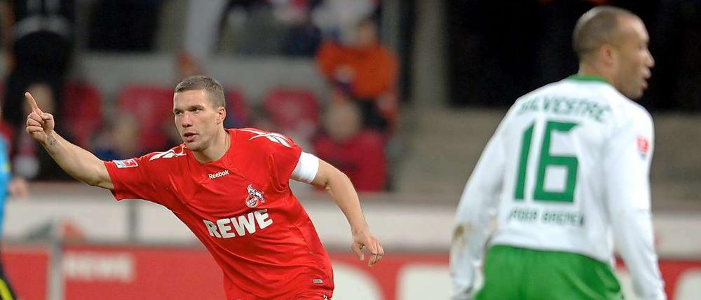 Podolski jubelt, Silvestre grummelt: Köln schlägt Bremen unter anderem durch zwei Tore des deutsche Nationalspielers.